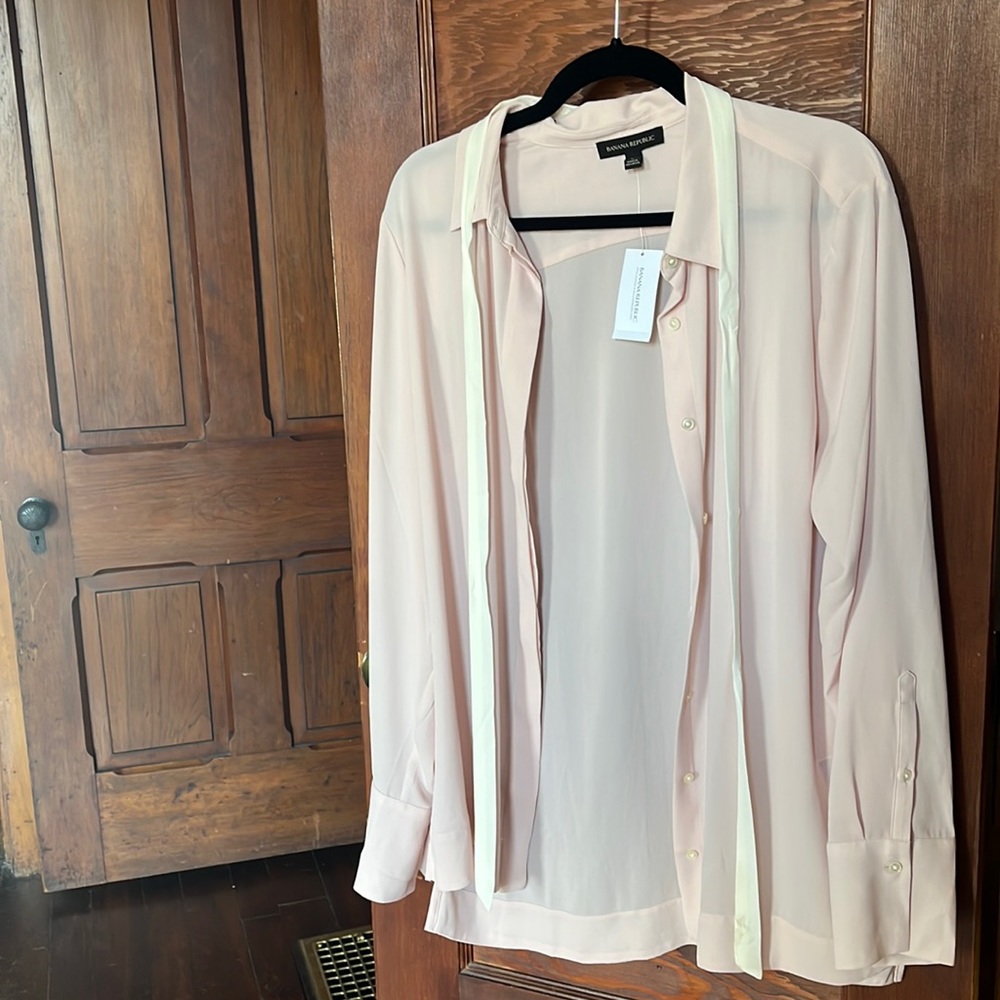 Large, pink, Banana Republic blouse, new with tags, small stain on “tie.”